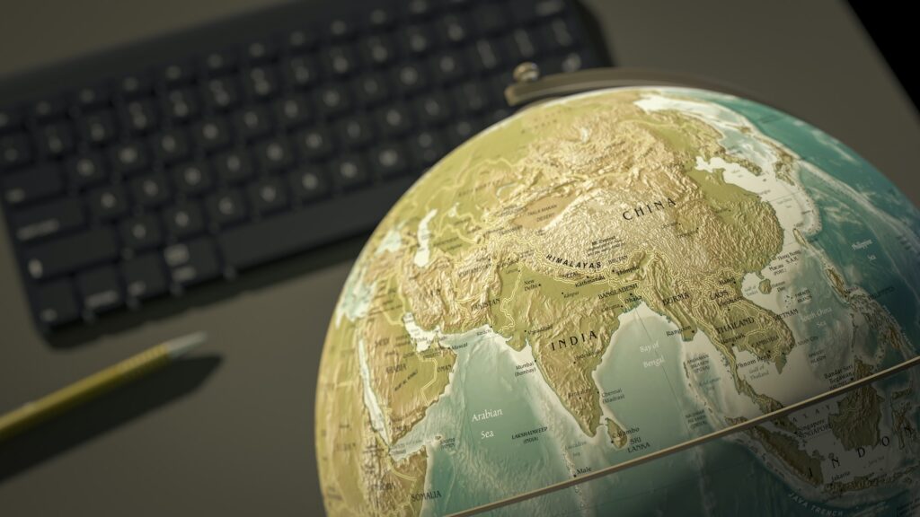 globe on a desktop shows India